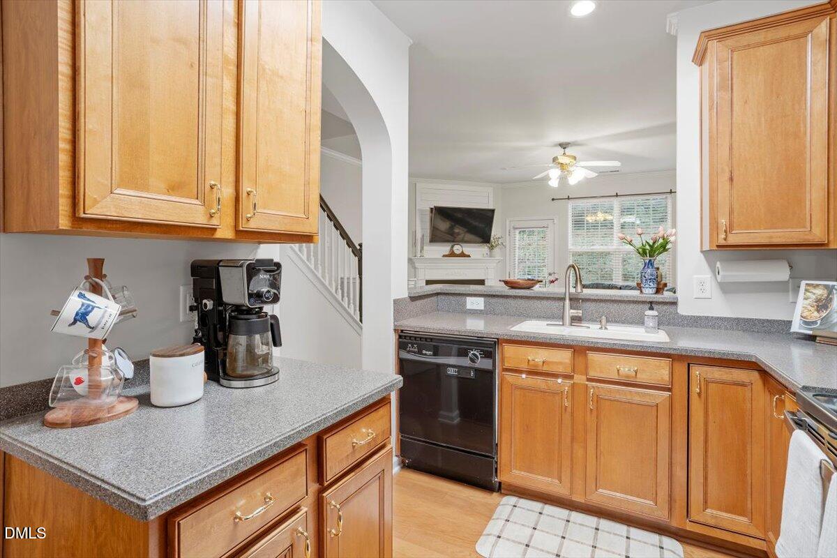 5349 Silver Moon Lane Raleigh, NC 27606 - Photo 12 of 41 a kitchen with sink cabinets and appliances