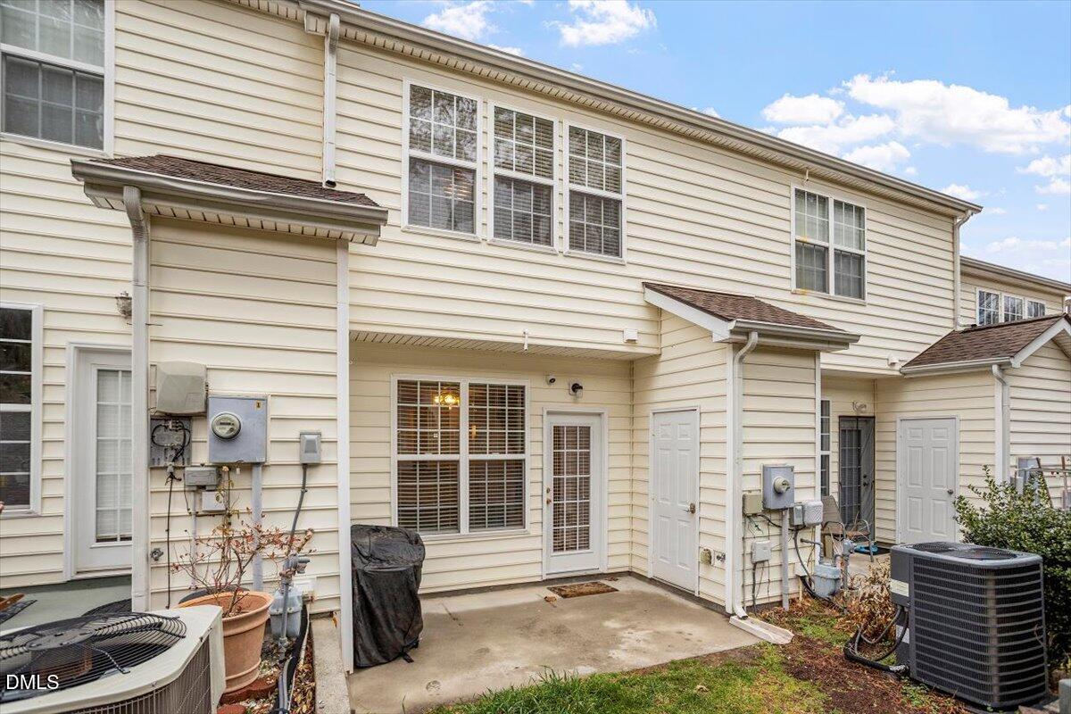 5349 Silver Moon Lane Raleigh, NC 27606 - Photo 37 of 41 a front view of a house with a yard