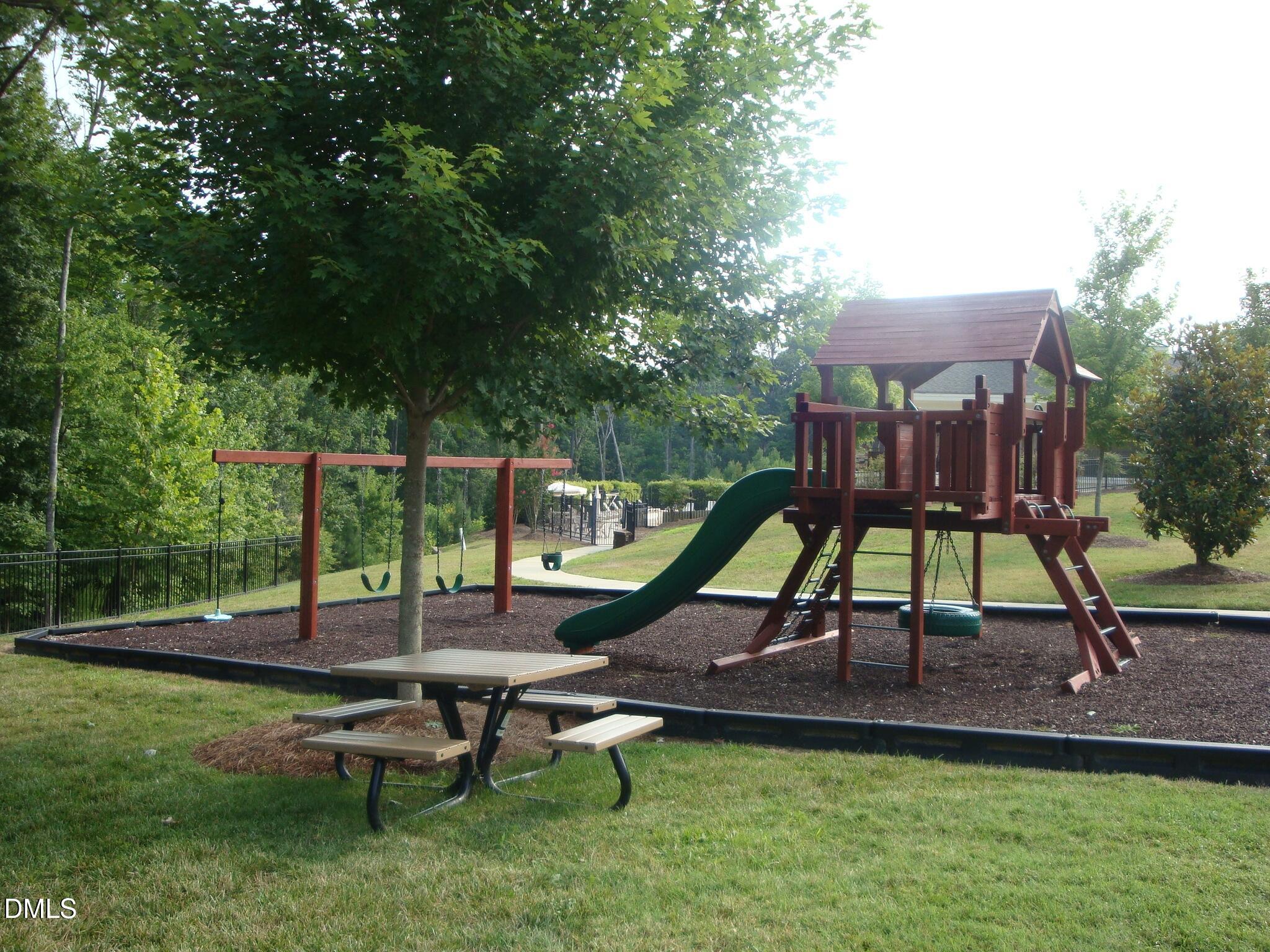 5349 Silver Moon Lane Raleigh, NC 27606 - Photo 39 of 41 a view of a park with slide