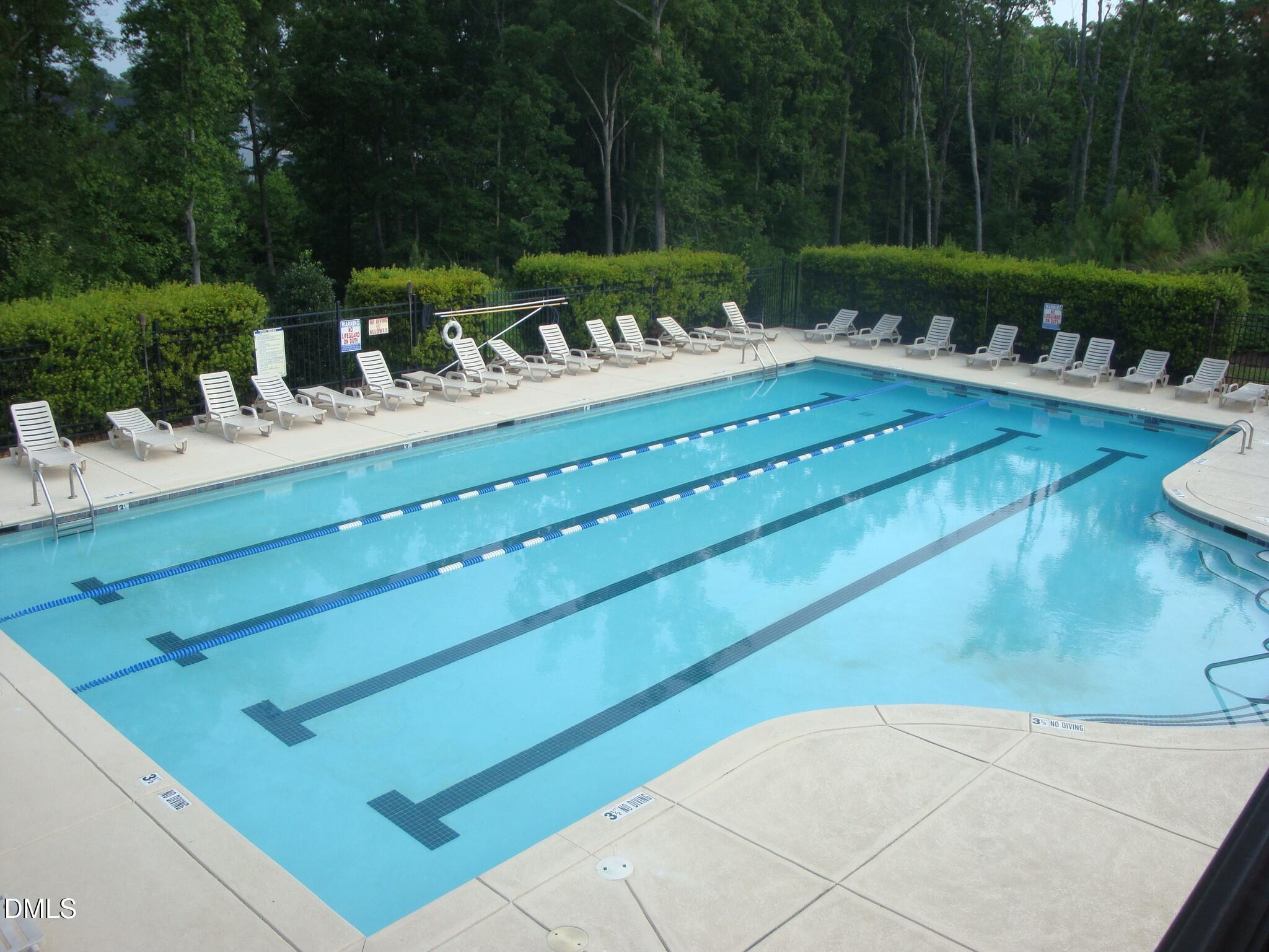 5349 Silver Moon Lane Raleigh, NC 27606 - Photo 40 of 41 a view of a chairs and table in patio
