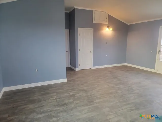 a bathroom with a granite countertop sink and a vanity