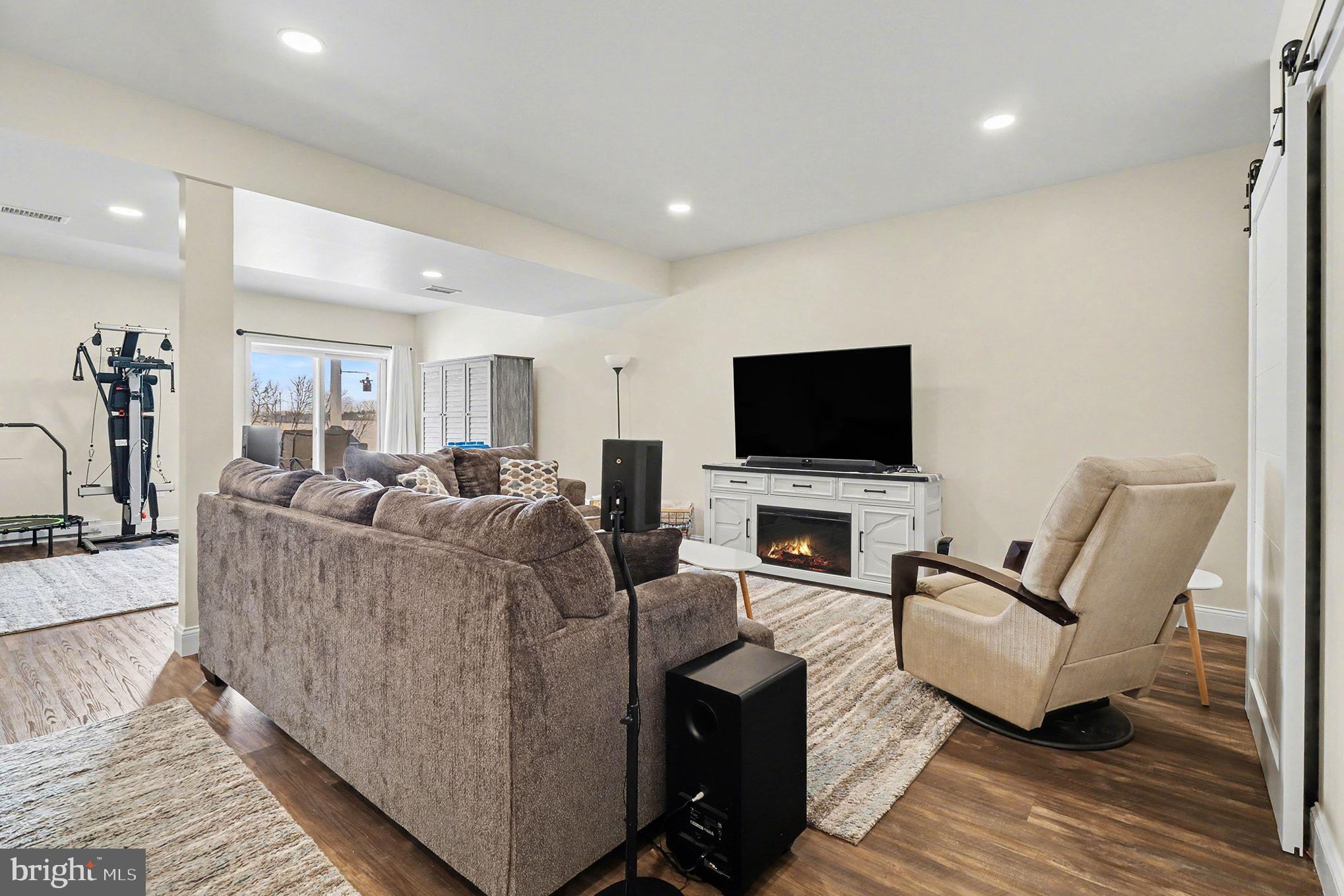 467 Hamilton Court Manheim, PA 17545 - Photo 17 of 48 a living room with furniture and a flat screen tv