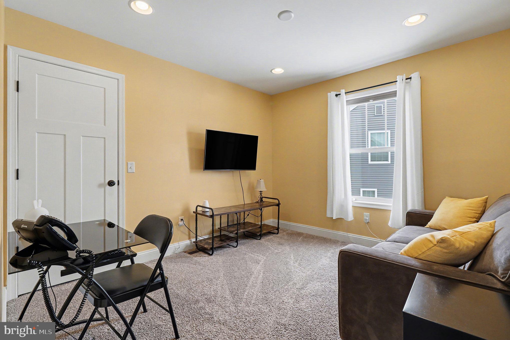 467 Hamilton Court Manheim, PA 17545 - Photo 25 of 48 a living room with furniture and a flat screen tv