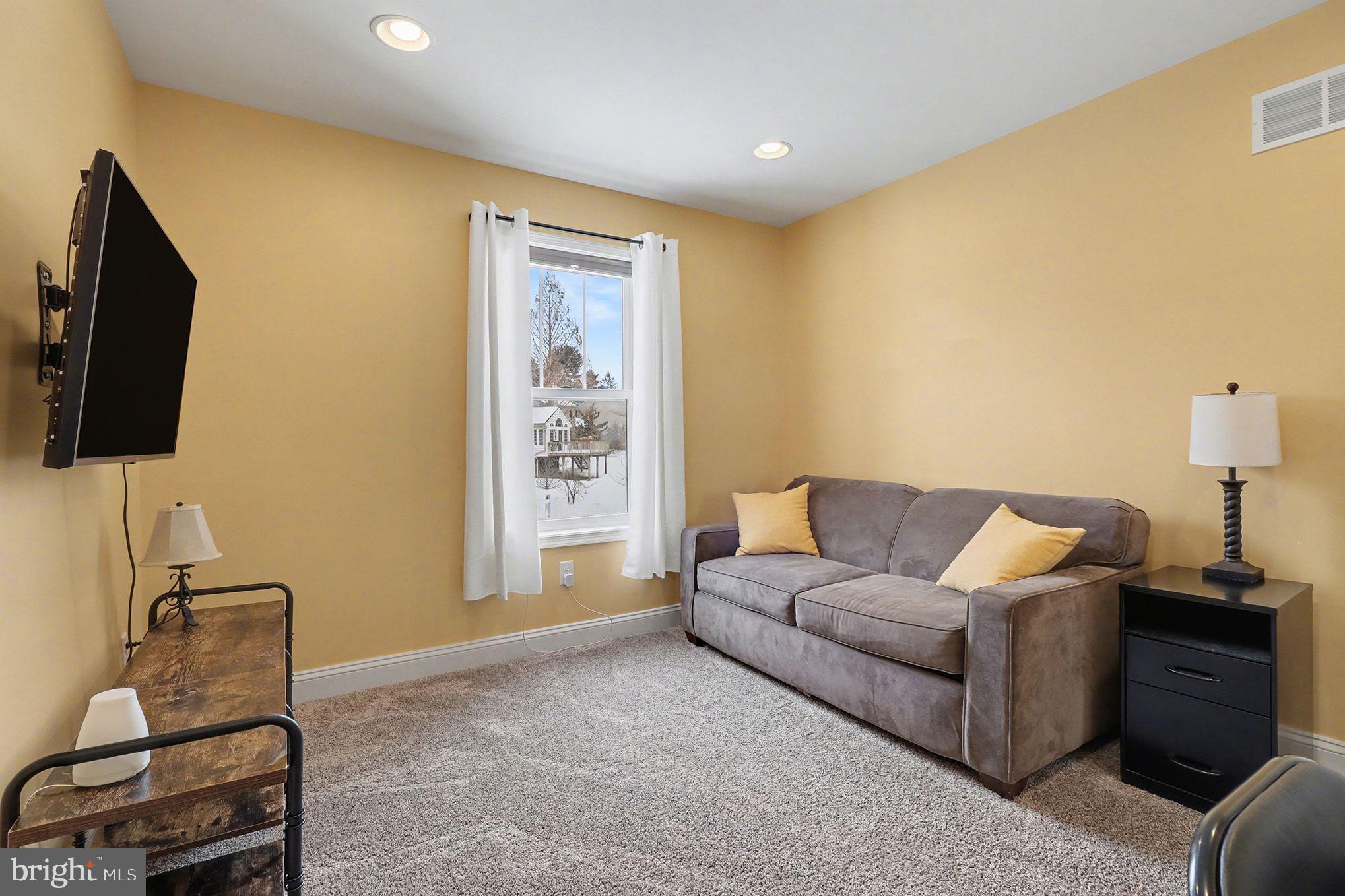 467 Hamilton Court Manheim, PA 17545 - Photo 26 of 48 a living room with furniture and a flat screen tv