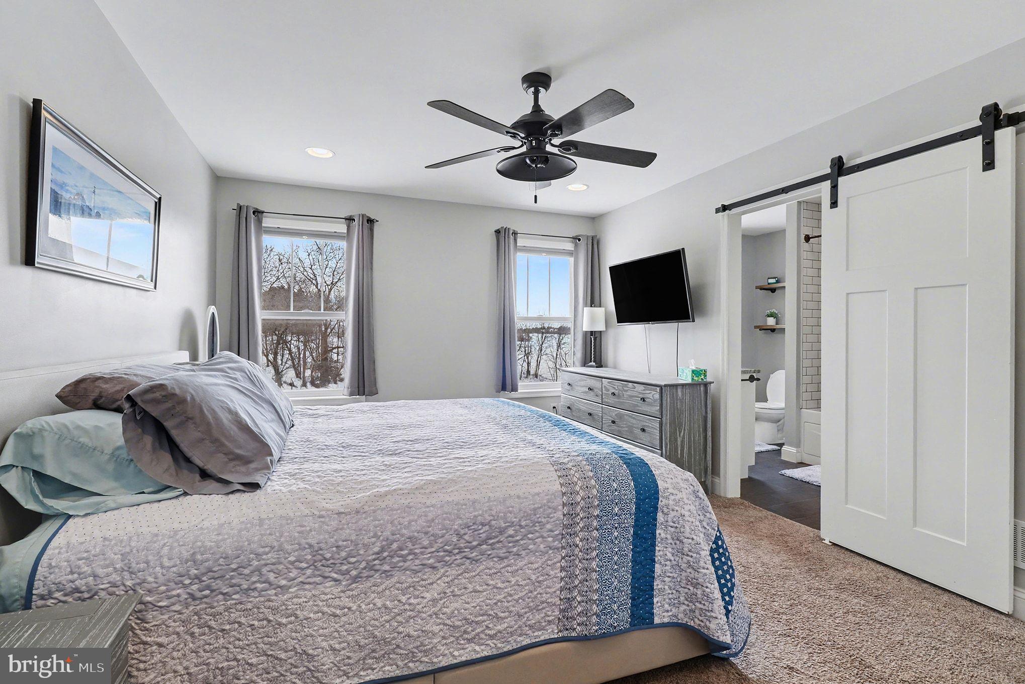 467 Hamilton Court Manheim, PA 17545 - Photo 30 of 48 a bedroom with a bed and a flat screen tv