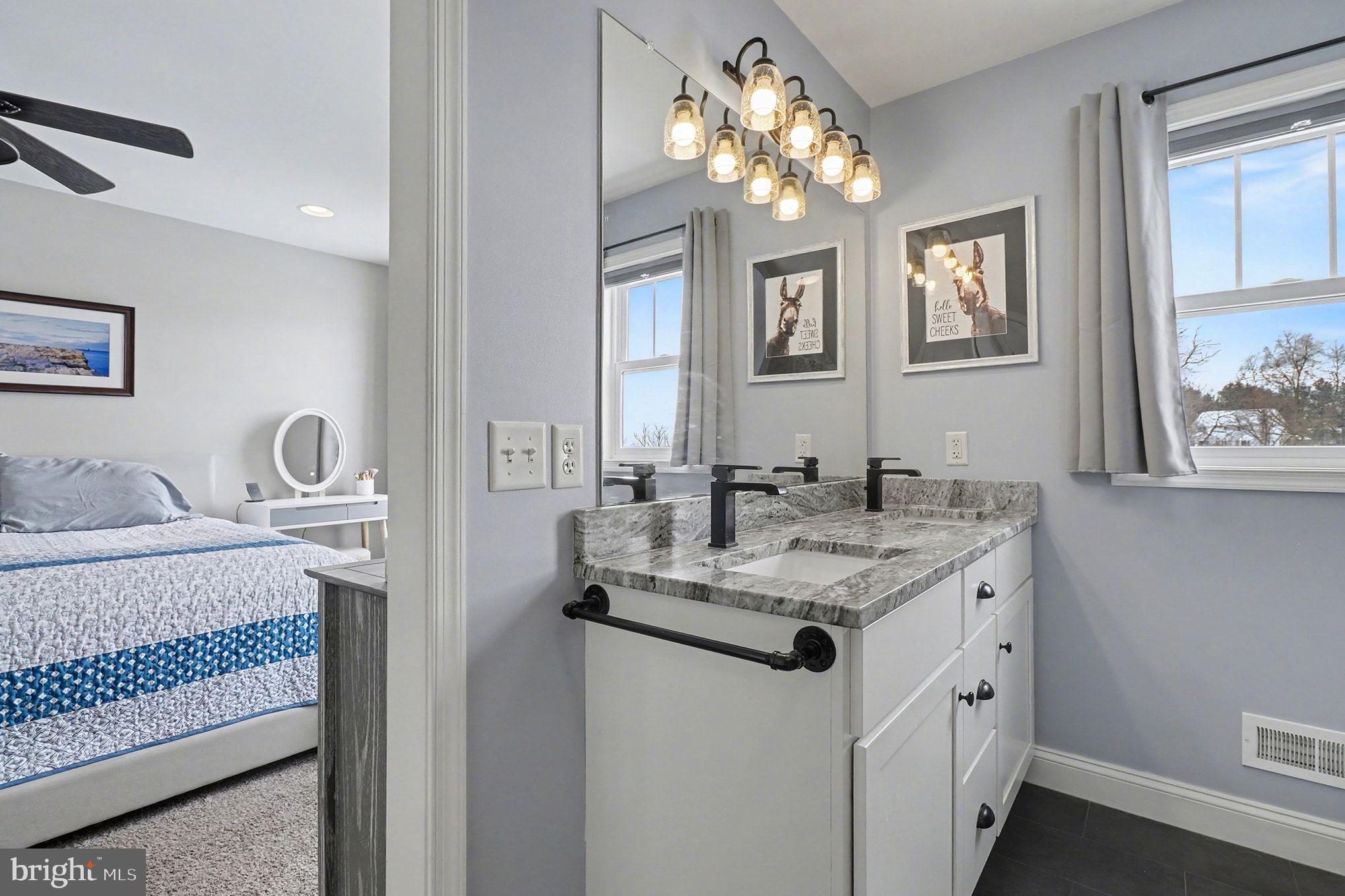 467 Hamilton Court Manheim, PA 17545 - Photo 35 of 48 a spacious bathroom with a granite countertop double vanity and a mirror