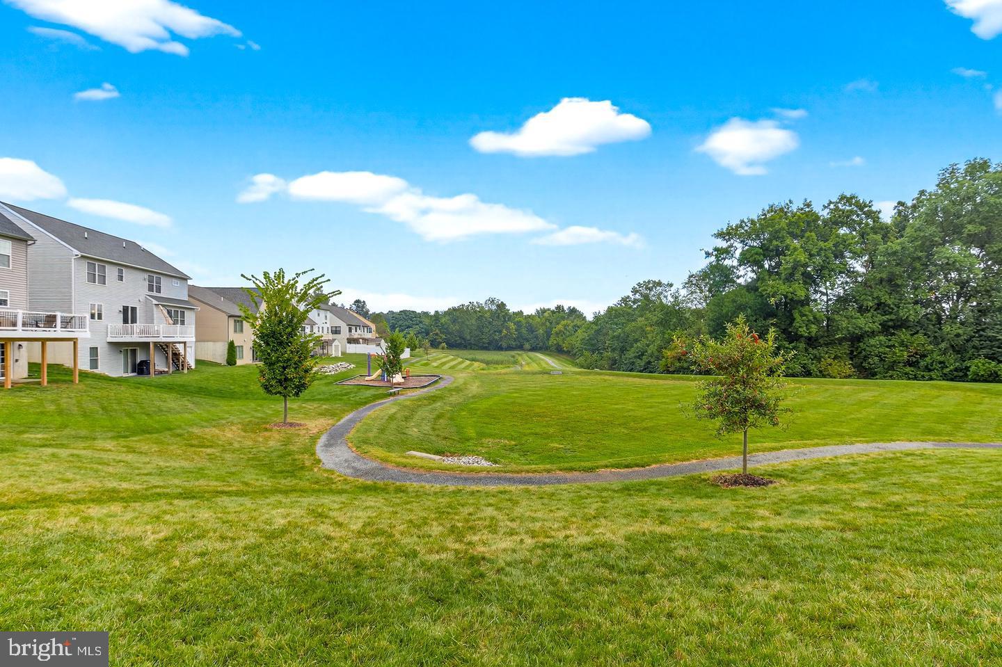 467 Hamilton Court Manheim, PA 17545 - Photo 45 of 48 a view of a golf course with a lake