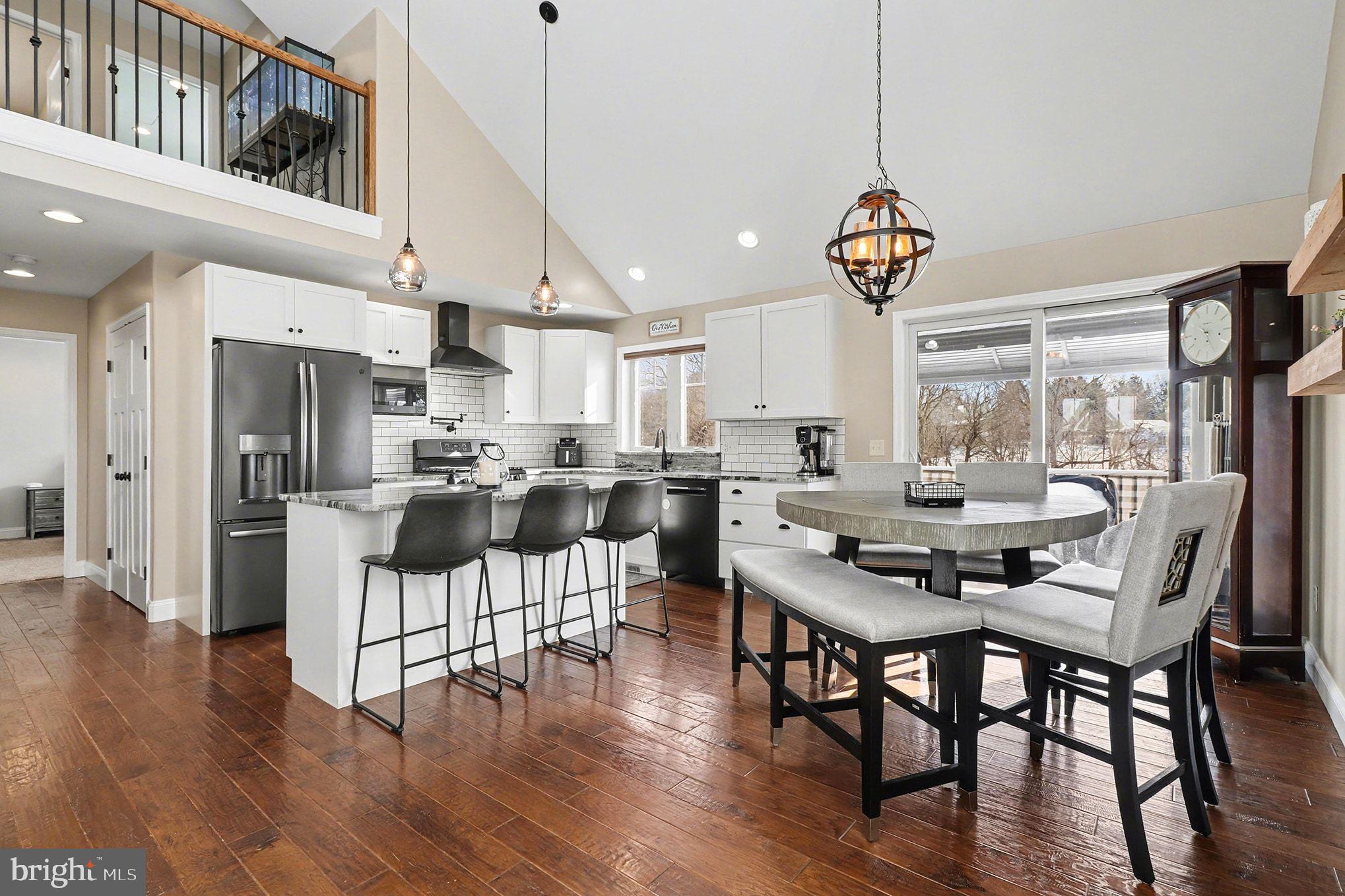 467 Hamilton Court Manheim, PA 17545 - Photo 9 of 48 a view of a dining room with furniture wooden floor and chandelier