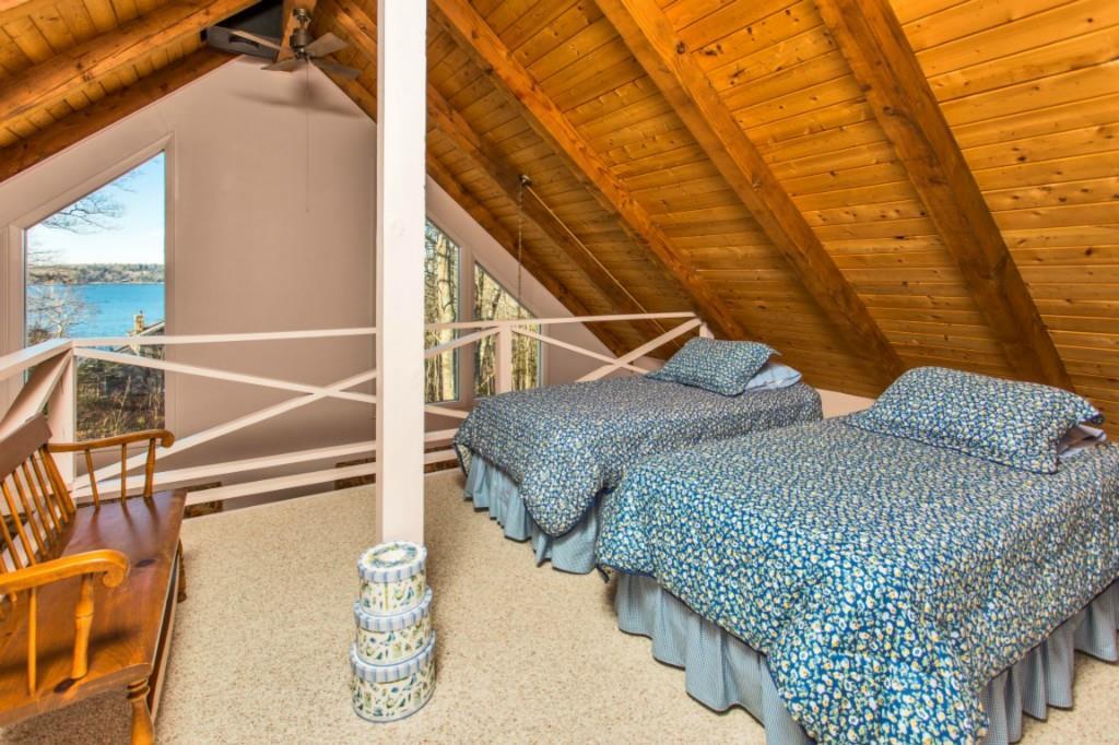 13 Poore Road East Boothbay, ME 04544 - Photo 28 of 31 The loft, with closet and carpeting,...