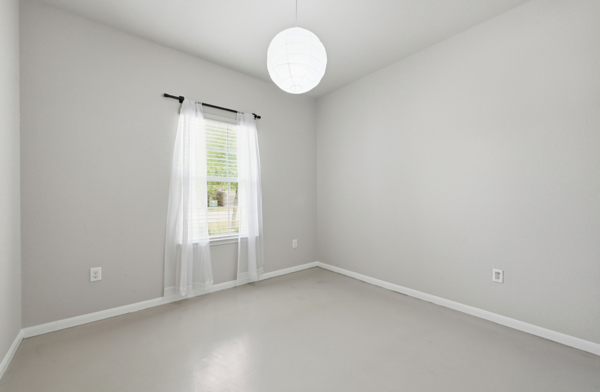 9716 Baden Lane Austin, TX 78754 - Photo 23 of 30 a view of an empty room with a window