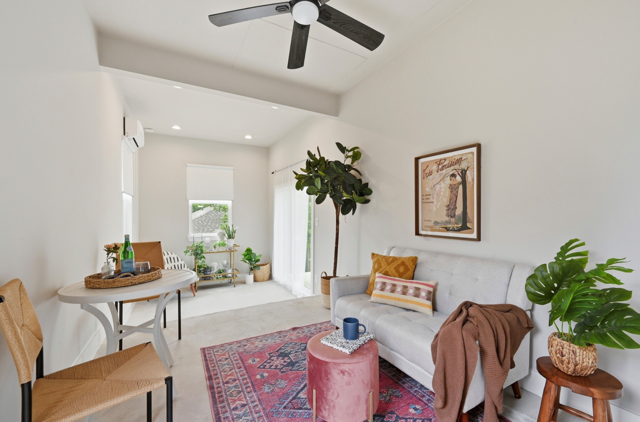 9716 Baden Lane Austin, TX 78754 - Photo 27 of 30 a living room with furniture and a potted plant