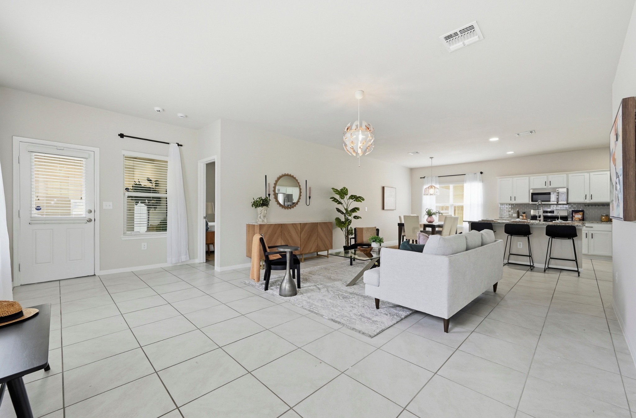 9716 Baden Lane Austin, TX 78754 - Photo 4 of 30 a living room with furniture and a table