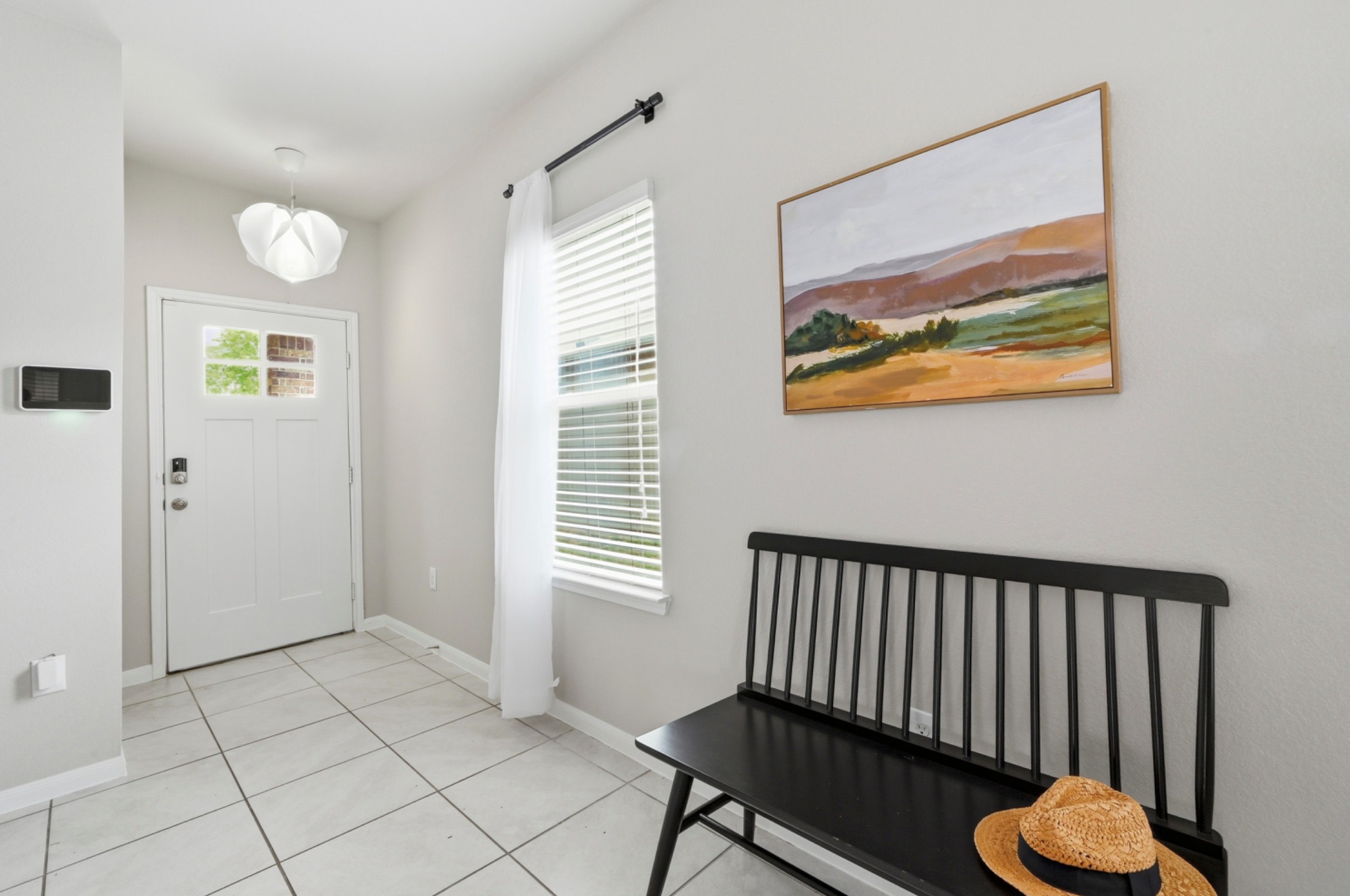 9716 Baden Lane Austin, TX 78754 - Photo 5 of 30 a view of a bedroom with furniture and windows