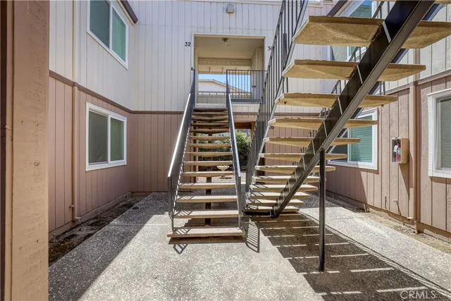 a view of entryway with a front door