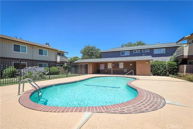 a view of a house with a swimming pool