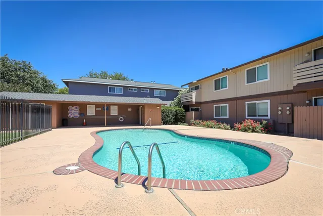 a view of a house with swimming pool
