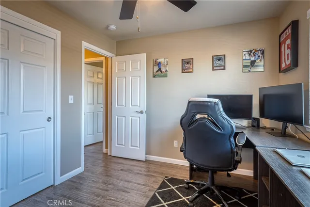 a workspace with furniture and lamp