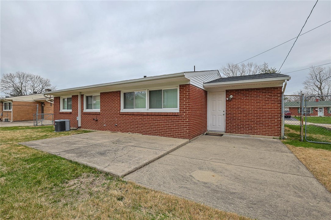 4307 Meadowcroft Road Dayton, OH 45429 - Photo 22 of 26 This brick residence offers a straightforward design with a spacious patio area.