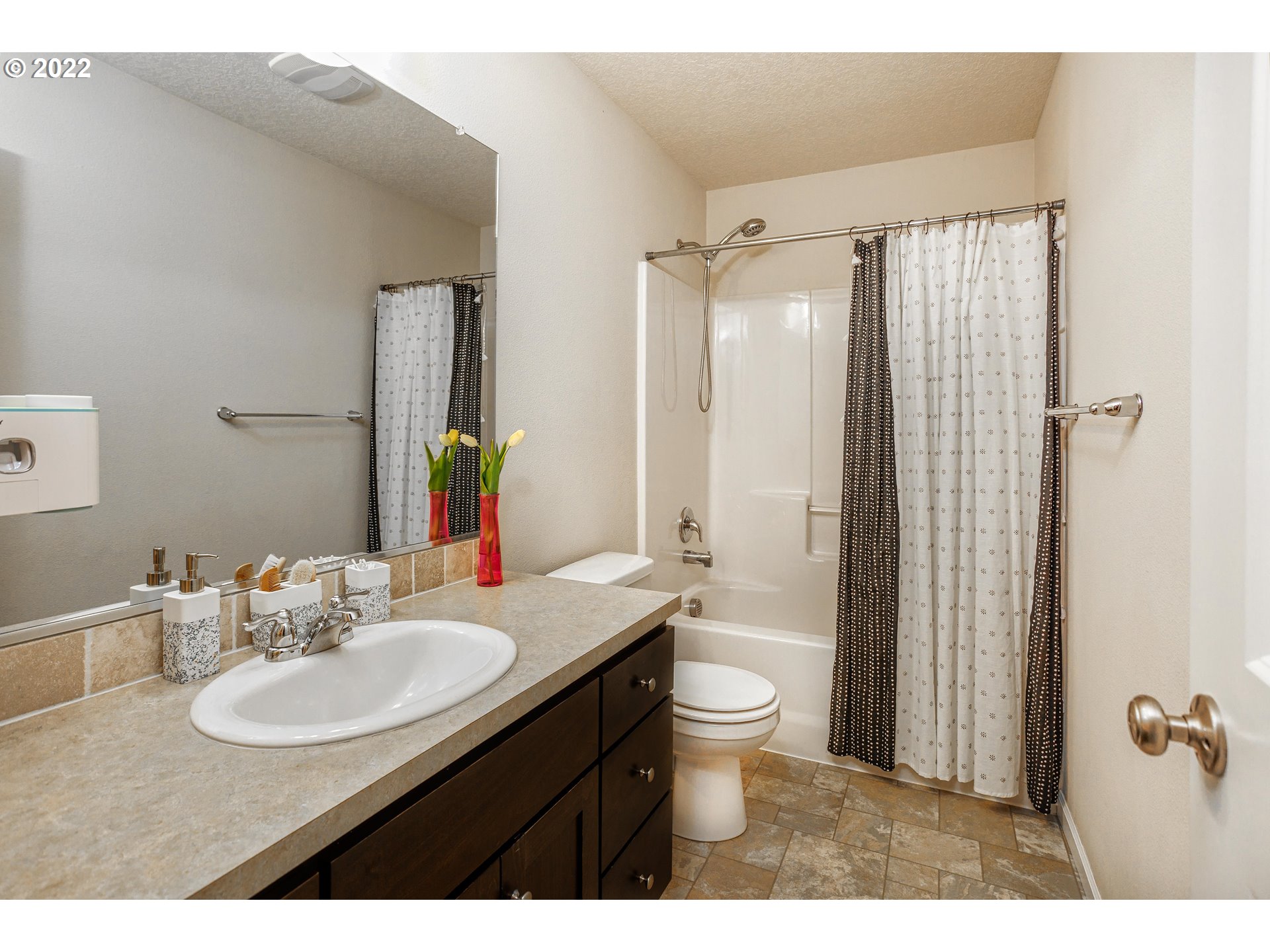 2732 South Red Tail Loop Ridgefield, WA 98642 - Photo 21 of 28 a bathroom with a sink toilet double vanity and shower