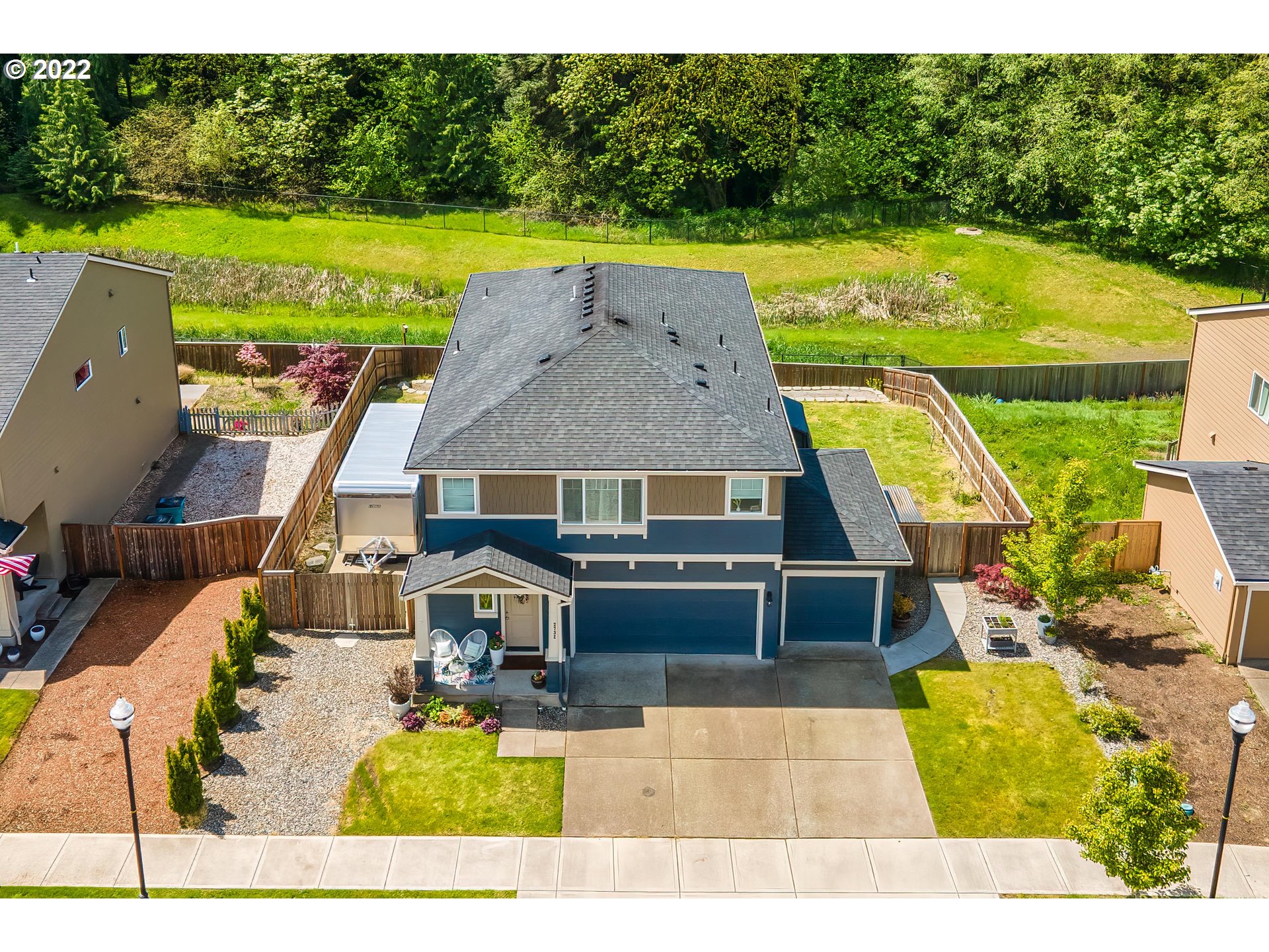 2732 South Red Tail Loop Ridgefield, WA 98642 - Photo 25 of 28 a view of a house with a swimming pool