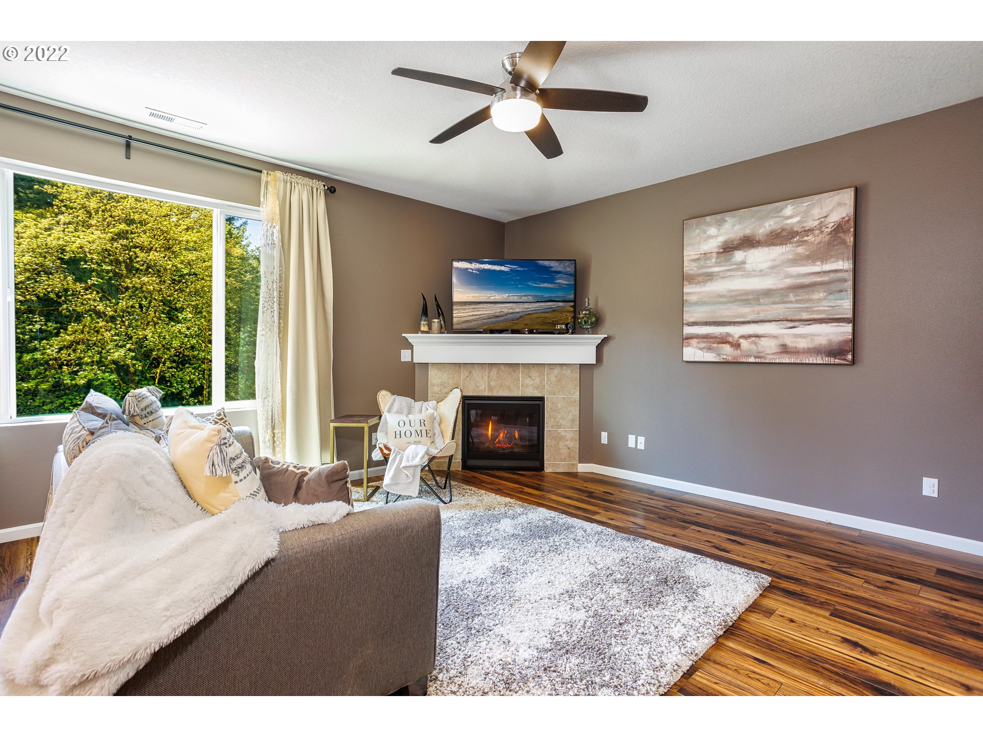 2732 South Red Tail Loop Ridgefield, WA 98642 - Photo 5 of 28 a living room with furniture and a fireplace