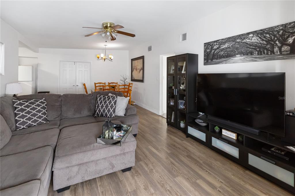 4303 Anderson Road Orlando, FL 32812 - Photo 18 of 47 a living room with furniture and a flat screen tv