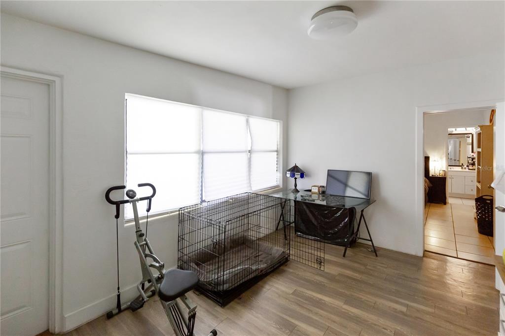 4303 Anderson Road Orlando, FL 32812 - Photo 22 of 47 a living room with furniture and a window