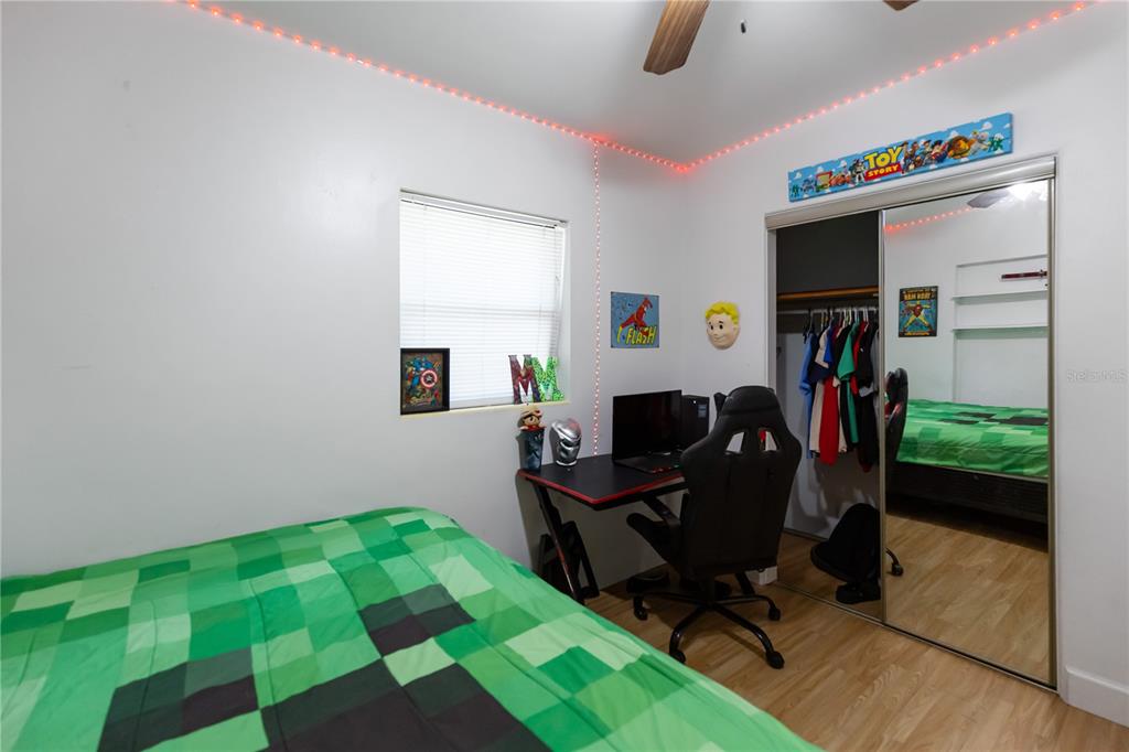 4303 Anderson Road Orlando, FL 32812 - Photo 28 of 47 a view of a workspace with furniture and a window