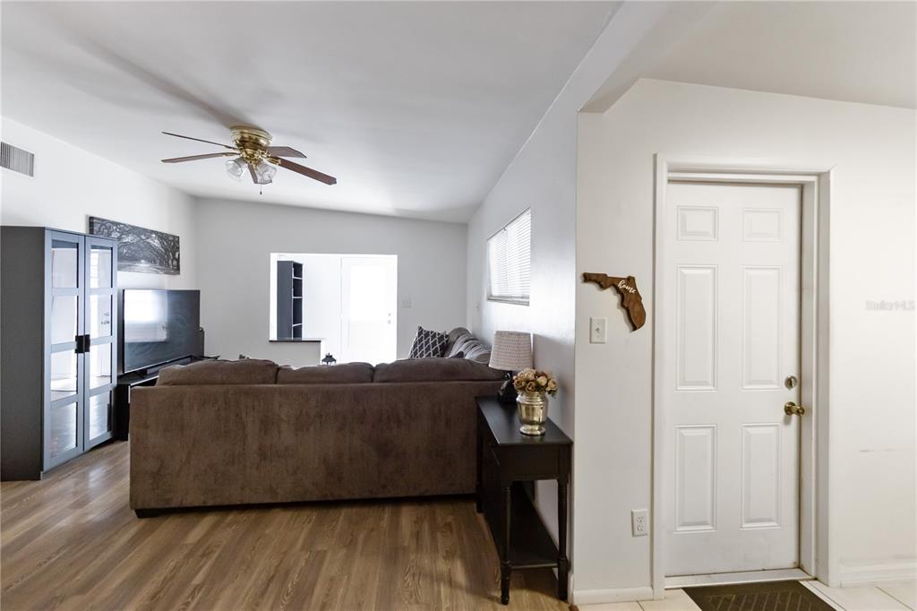 4303 Anderson Road Orlando, FL 32812 - Photo 34 of 47 a living room with furniture and a window
