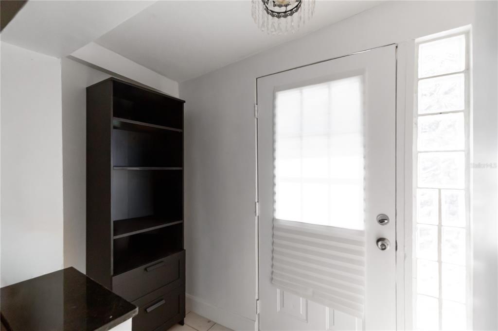 4303 Anderson Road Orlando, FL 32812 - Photo 35 of 47 a view of walk in closet with empty racks