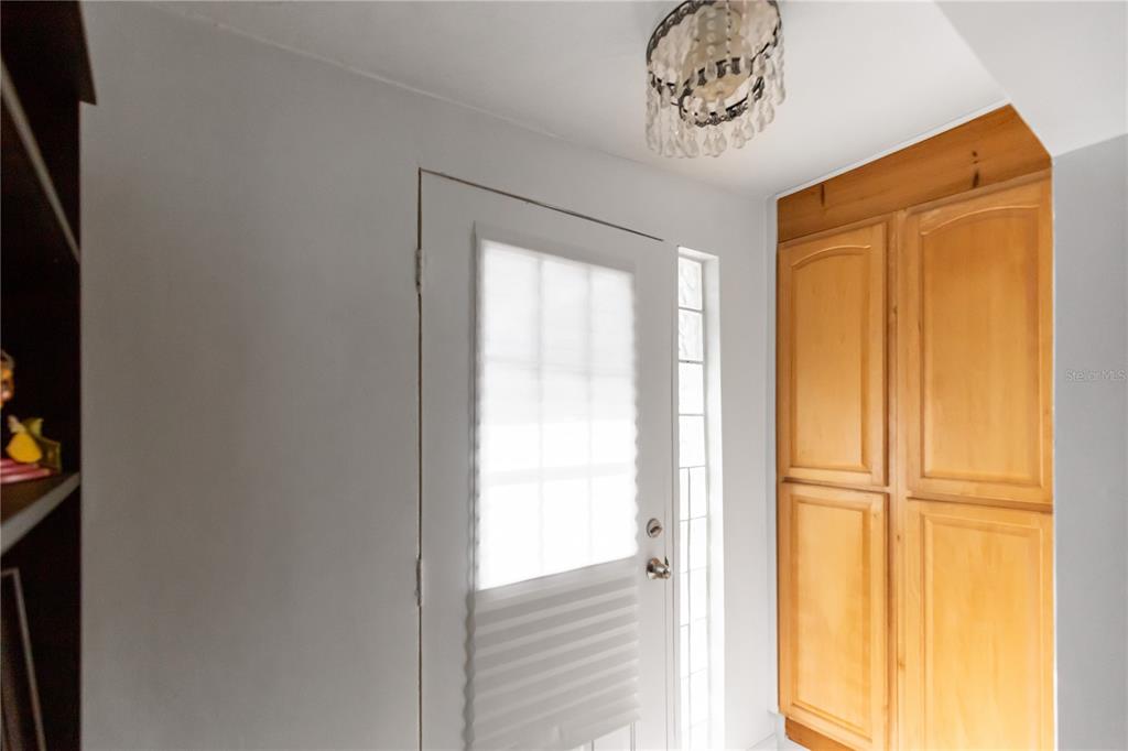 4303 Anderson Road Orlando, FL 32812 - Photo 36 of 47 a view of a hallway with wooden floor