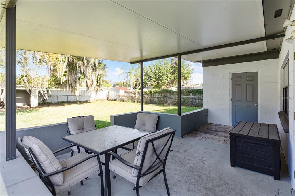 4303 Anderson Road Orlando, FL 32812 - Photo 38 of 47 a dining room with furniture and window