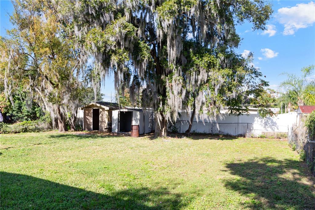 4303 Anderson Road Orlando, FL 32812 - Photo 41 of 47 a view of a house with yard and tree s