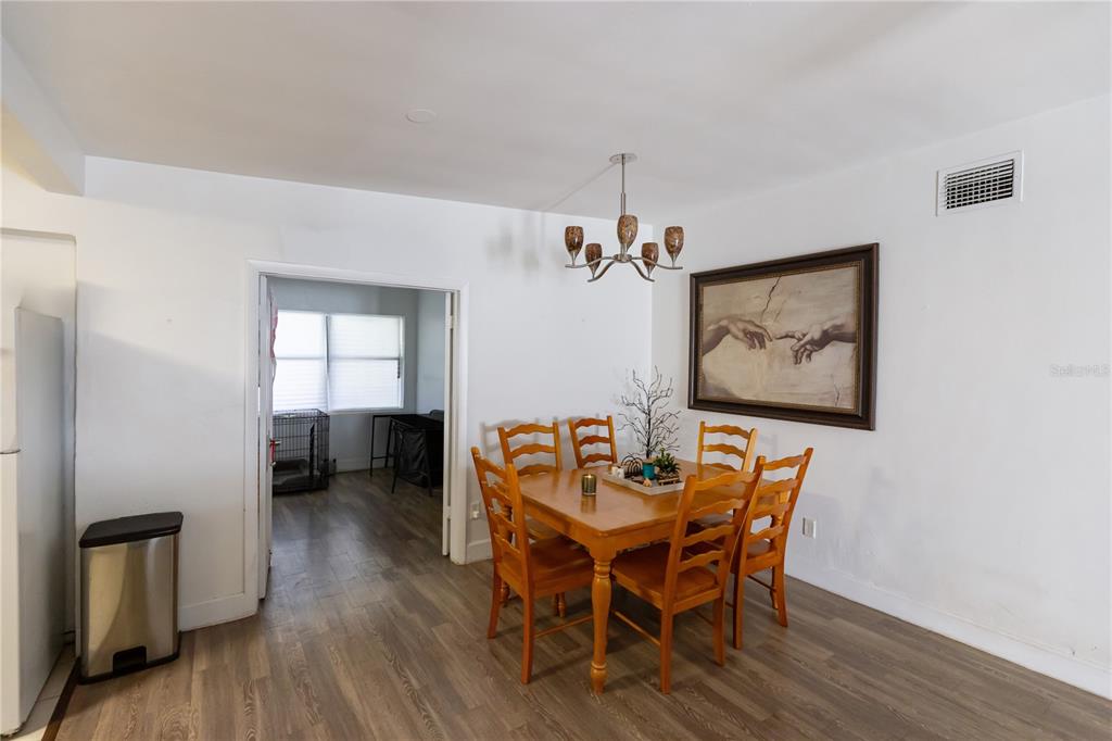 4303 Anderson Road Orlando, FL 32812 - Photo 7 of 47 a dining room with furniture and window