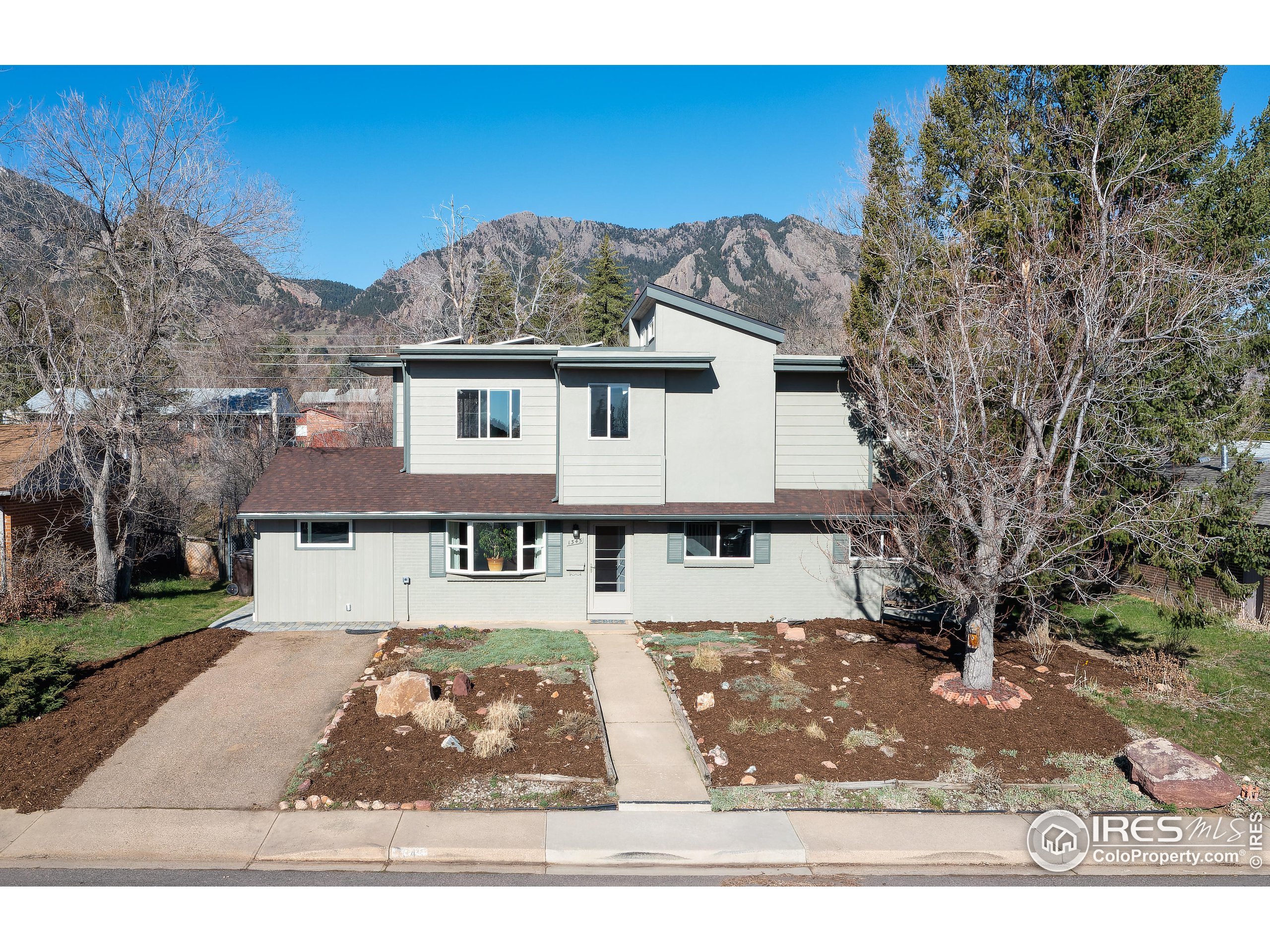 1345 Georgetown Road Boulder, CO 80305 - Photo 1 of 39 front view of a house with a yard