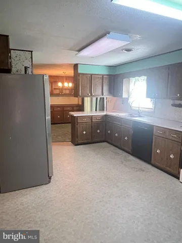 a bathroom with a sink a vanity and a mirror