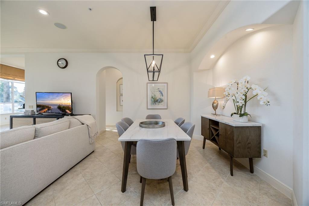 15532 Monterosso Lane, Unit 102 Naples, FL 34110 - Photo 14 of 49 a view of a livingroom with furniture and window
