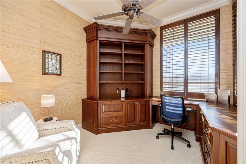 15532 Monterosso Lane, Unit 102 Naples, FL 34110 - Photo 22 of 49 a view of a workspace with furniture and a window