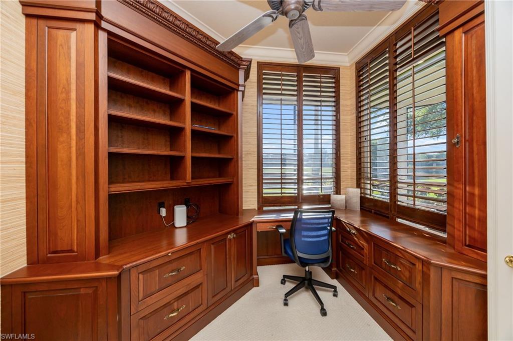 15532 Monterosso Lane, Unit 102 Naples, FL 34110 - Photo 23 of 49 a view of a workspace with furniture and a window