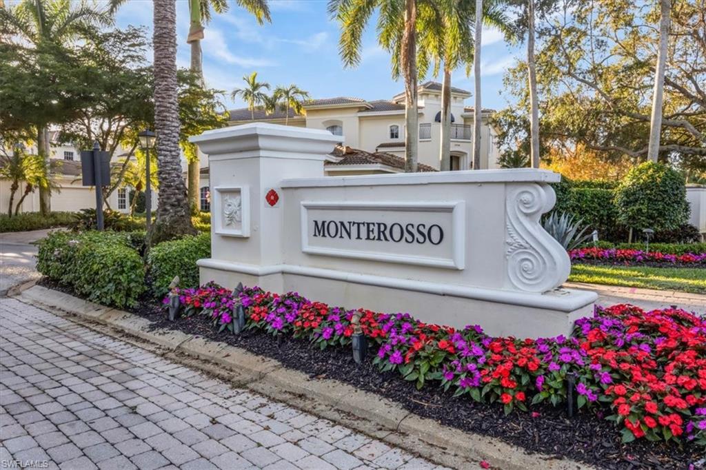 15532 Monterosso Lane, Unit 102 Naples, FL 34110 - Photo 36 of 49 a sign on the side of a building