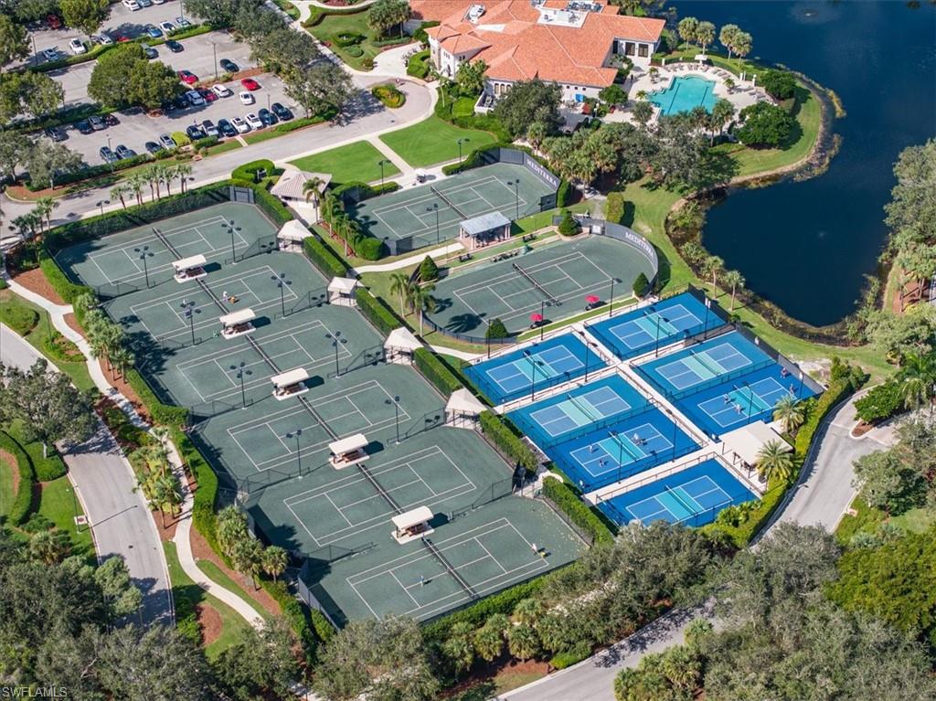 15532 Monterosso Lane, Unit 102 Naples, FL 34110 - Photo 42 of 49 an aerial view of a house with a yard
