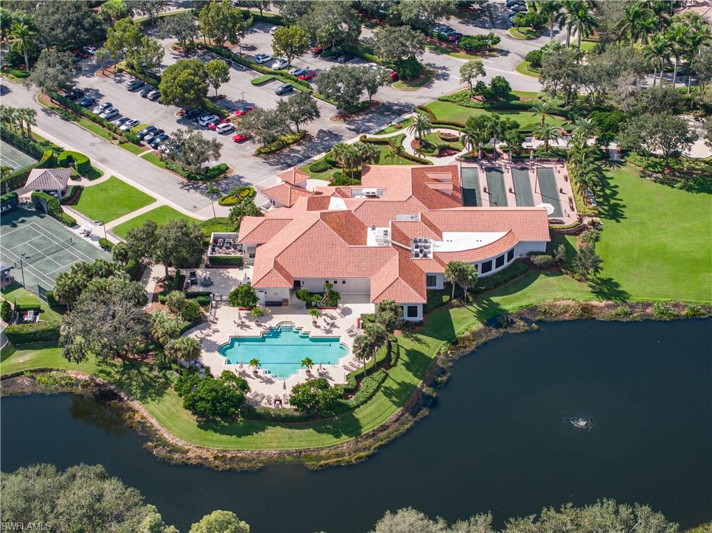 15532 Monterosso Lane, Unit 102 Naples, FL 34110 - Photo 44 of 49 an aerial view of a house with lake view