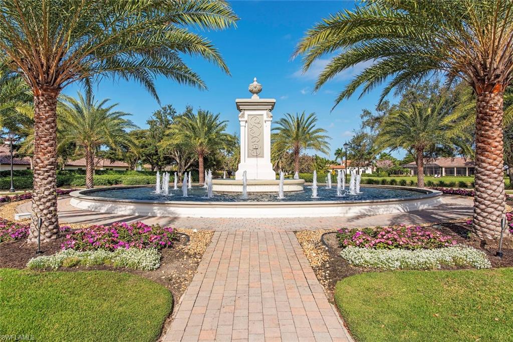 15532 Monterosso Lane, Unit 102 Naples, FL 34110 - Photo 49 of 49 a view of a garden with palm trees
