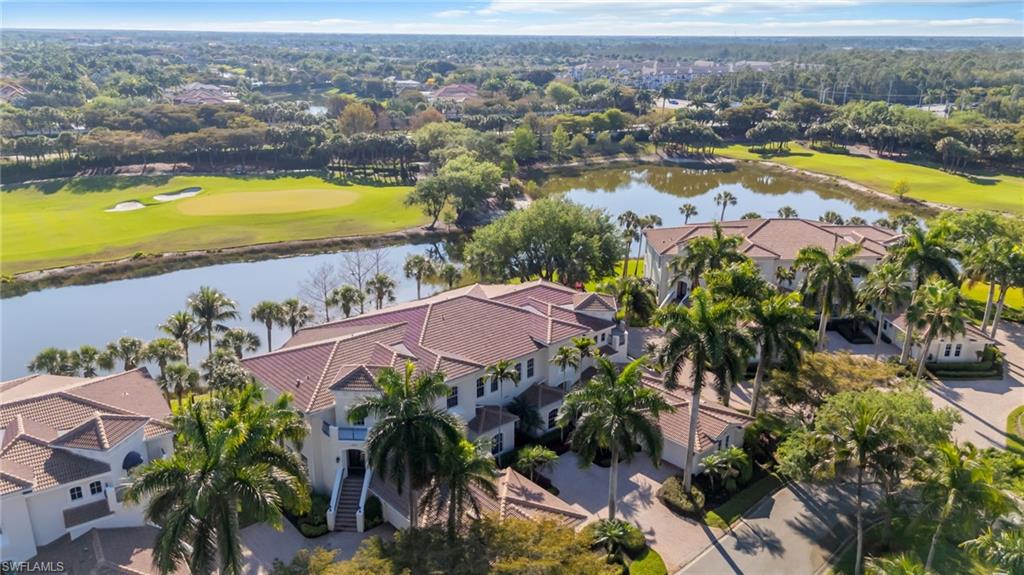 15532 Monterosso Lane, Unit 102 Naples, FL 34110 - Photo 5 of 49 an aerial view of residential houses with swimming pool and ocean view
