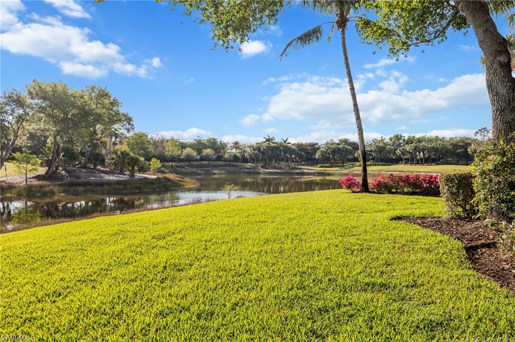 15532 Monterosso Lane, Unit 102 Naples, FL 34110 - Photo 7 of 49 a view of an outdoor space and swimming pool