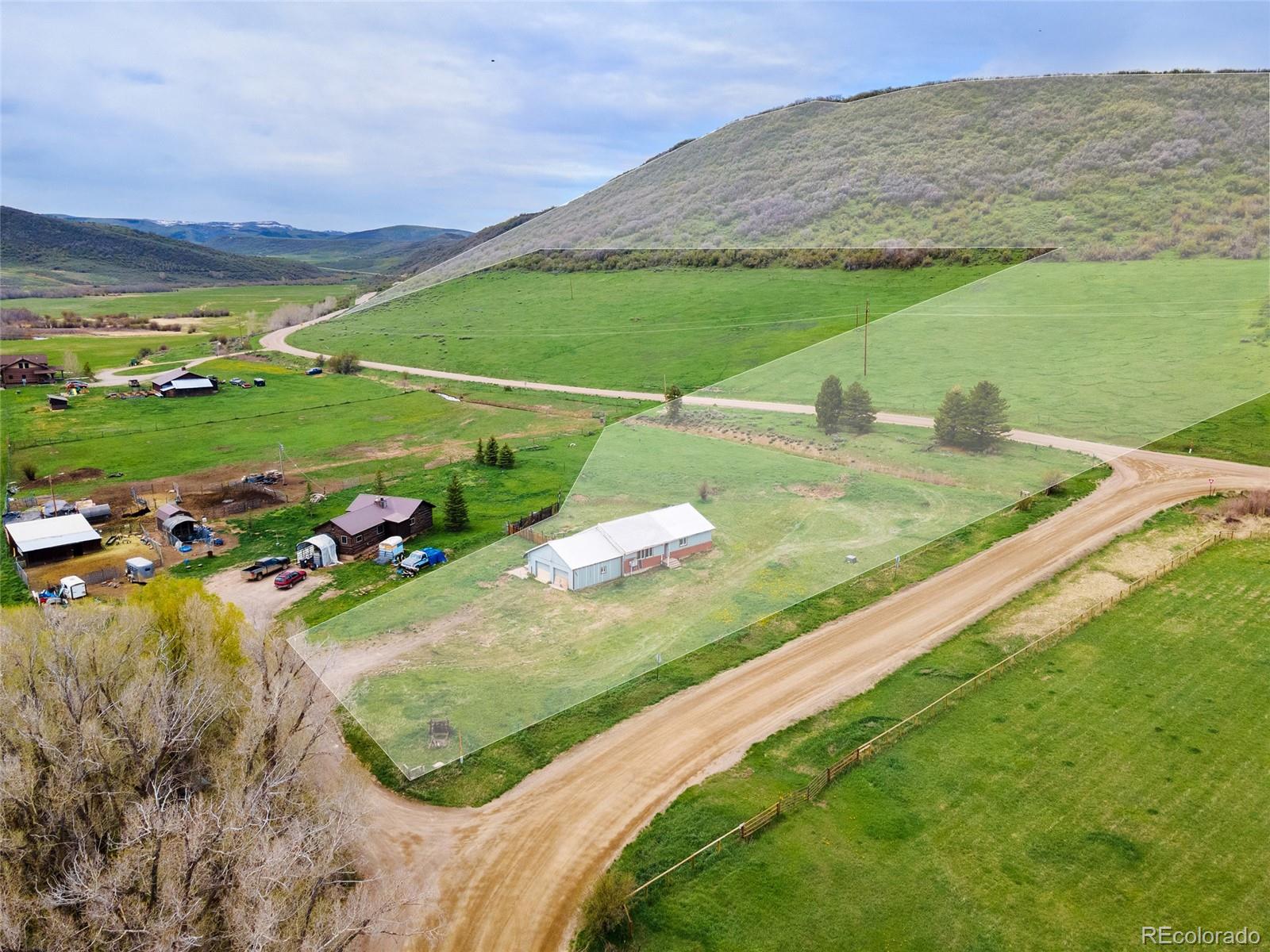 32655 County Road 179 Oak Creek, CO 80467 - Photo 1 of 20 a view of a golf course with a field
