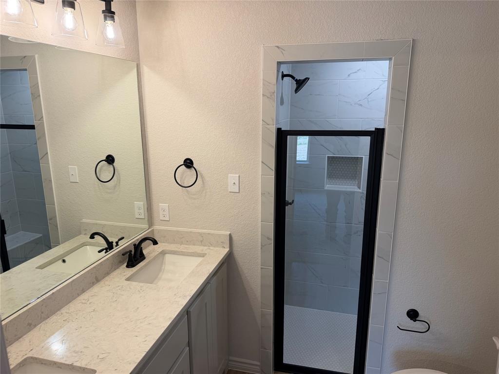 2998 Knob Road Springtown, TX 76082 - Photo 6 of 7 a bathroom with a sink and a mirror