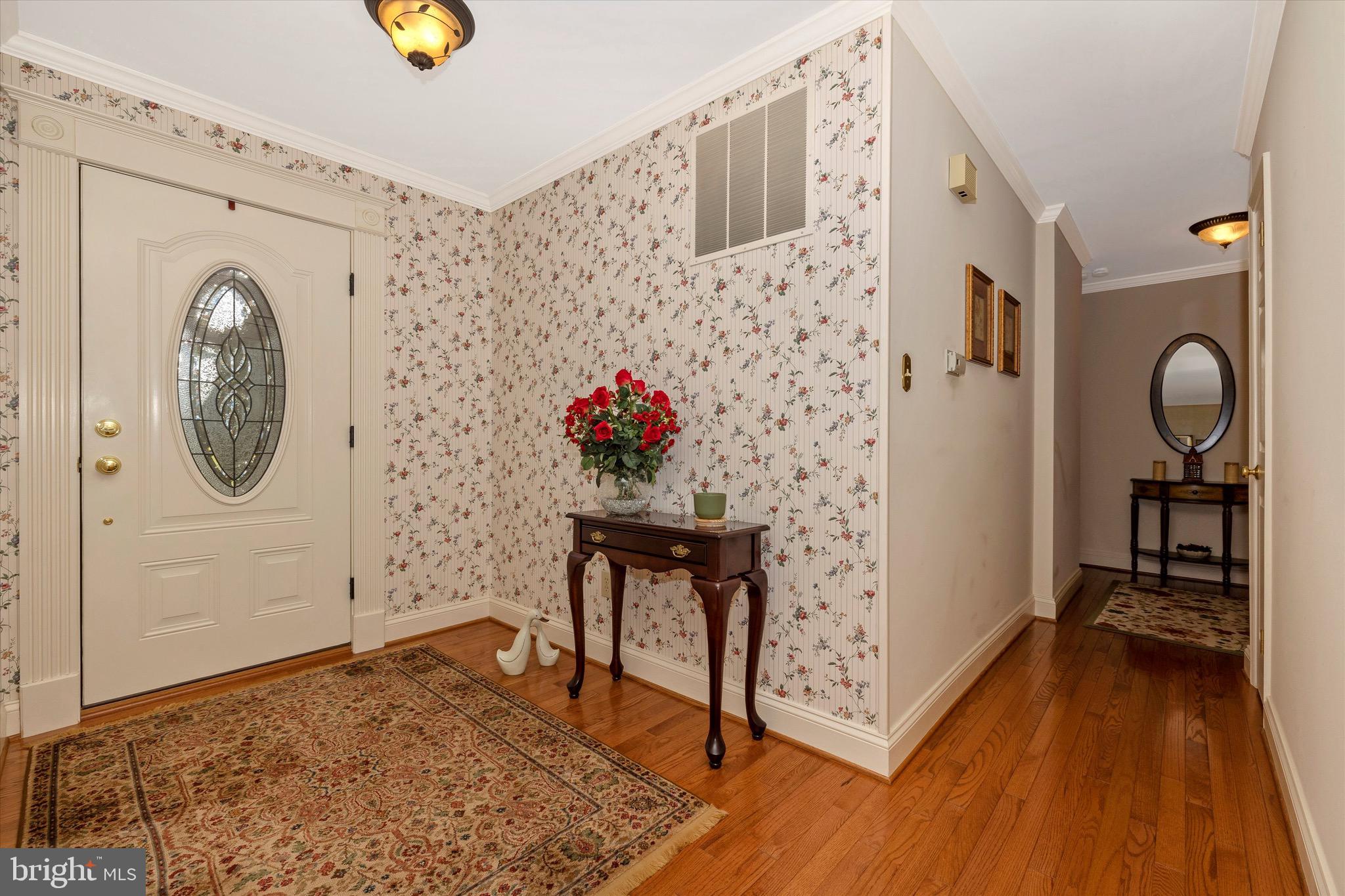 19448 Olney Mill Road Olney, MD 20832 - Photo 3 of 41 Gracious foyer with wood floors & closet