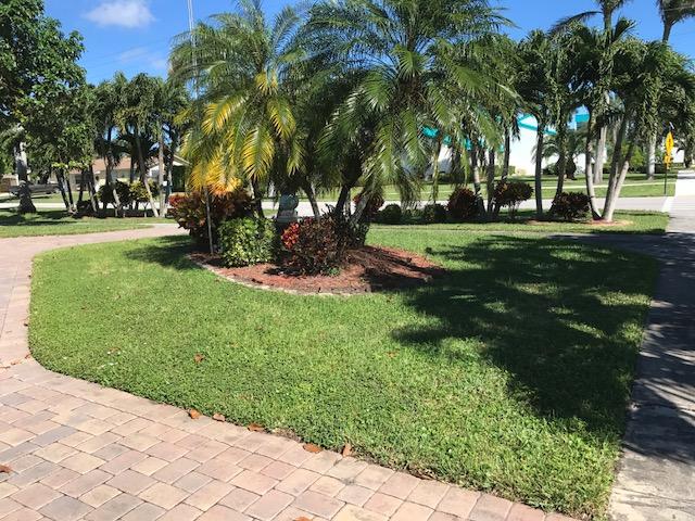 417 Davis Road Palm Springs, FL 33461 - Photo 6 of 6 Front Lawn