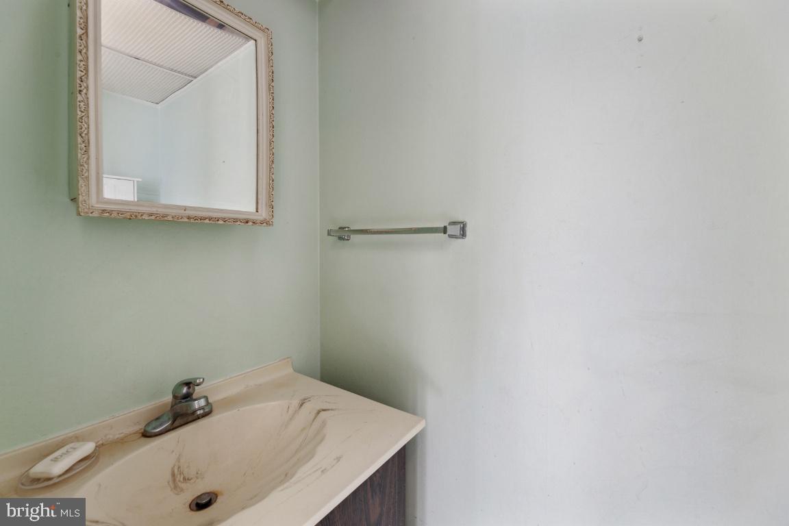 8488 Stonewall Road Manassas, VA 20110 - Photo 12 of 43 Powder room on main level